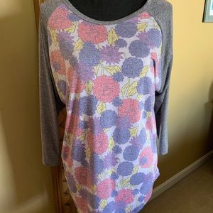 LulaRoe Randy top with poppy print.